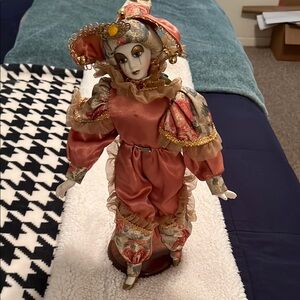 Elegant Harlequin Clown in Pink and Gold